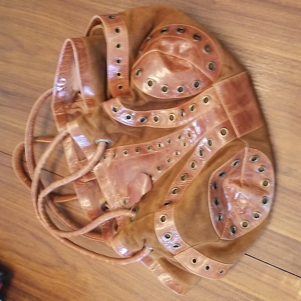 Le Chic tan leather and suede bucket style purse!